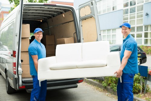 Person organizing boxes in Emersonpark storage during a home transition